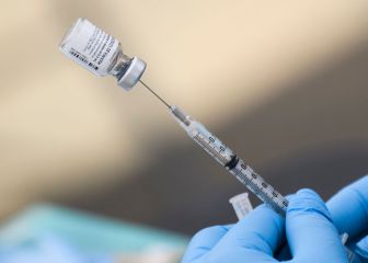 Why might vaccinated Americans need a booster shot?