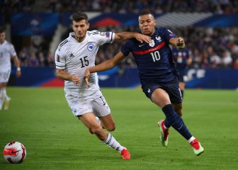 France settle for a draw after Koundé red card