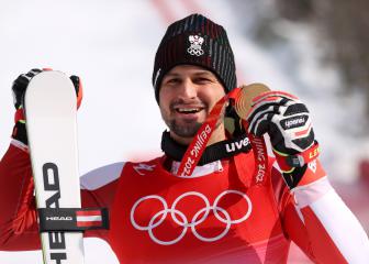 Strolz wins surprise gold to follow in his father's footsteps