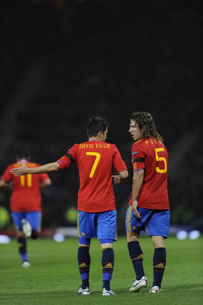 Villa y Puyol durante un partido con la selección española.