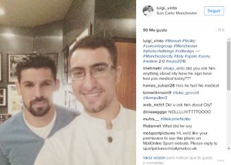 Nolito posing for photos with Manchester City fans