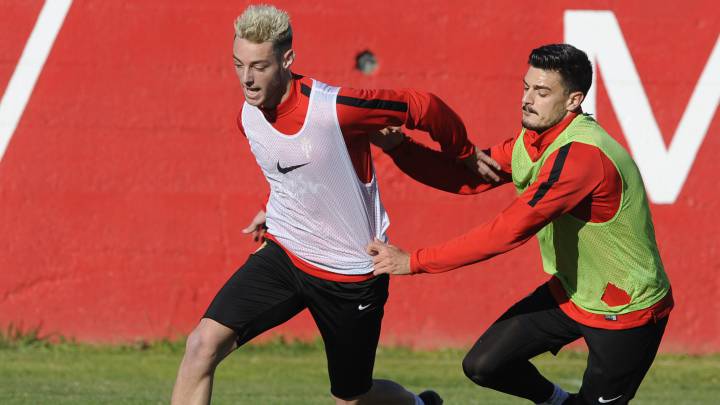 Burgui y Sergio durante el entrenamiento del Sporting