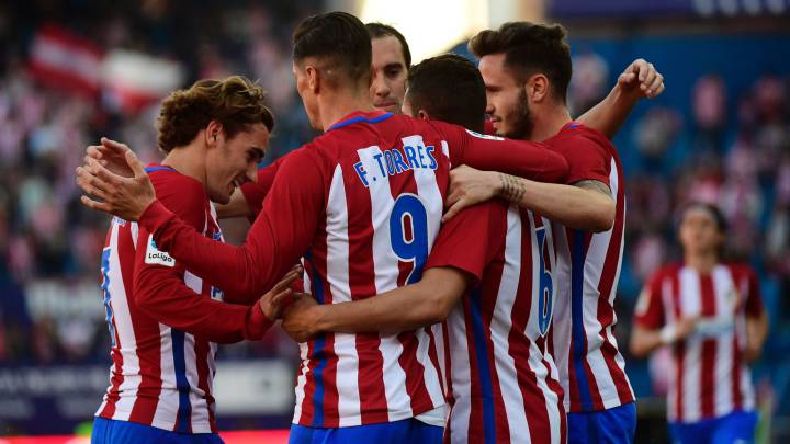 Atlético Madrid close in on Sevilla with commanding win