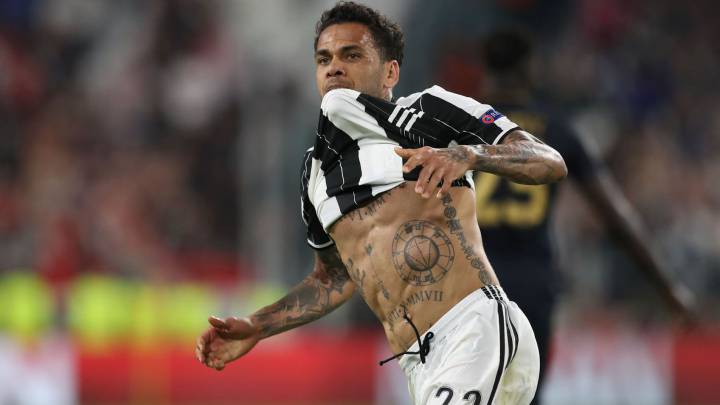 Juventus Defender from Brazil Dani Alves celebrates after scoring during the UEFA Champions League semi final second leg football match Juventus vs Monaco, on May 9, 2017 at the Juventus stadium in Turin.