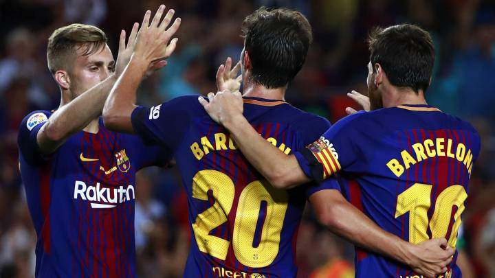 Gerard Deulofeu, Sergi Roberto y Leo Messi, durante un partido del Barcelona.