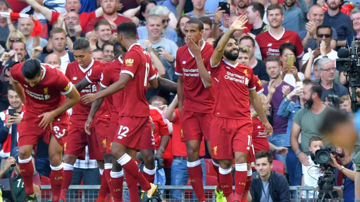 Los jugadores del Liverpool celebran un gol ante el Arsenal