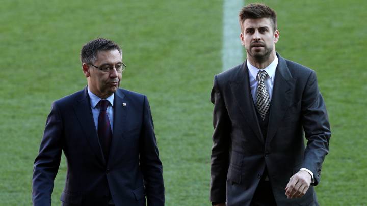 El presidente del Barcelona, Josep Maria Bartomeu, y Gerard Piqué.