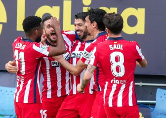 Atlético suffer but Suárez brace takes them to half-way 50 points