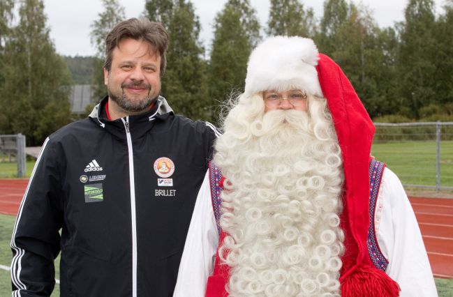 Ralf Wunderlich, entrenador, junto a Santa Claus.