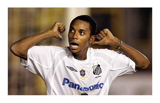 Con 12 años entró en las inferiores del Santos y tardó muy poco en ganarse los focos de la prensa al ser considerado el ‘Nuevo Pelé’. Incluso el astro brasileño le señaló como su sucesor. En 2002, firmó su primer contrato profesional y debutó con el primer equipo. Anotó 10 goles en 30 partidos.