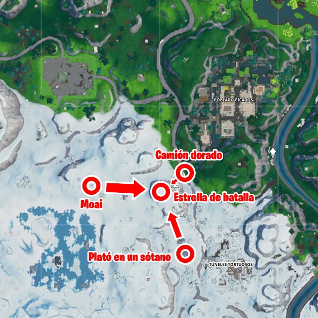 fortnite battle royale temporada 10 temporada x desafios taquillazo desafio busca entre una videocamara de sotano una cabeza de piedra nevada y un gran y llamativo trailer de oro mapa