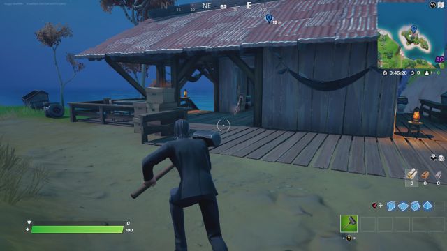 fortnite capitulo 2 temporada 7 desafios misiones semana 8 desafio mision visita cala coral campamento base golf y cabaña corriente