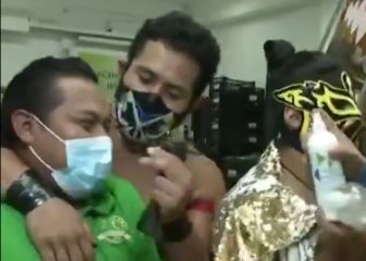 Luchadores profesionales promueven el uso de cubrebocas