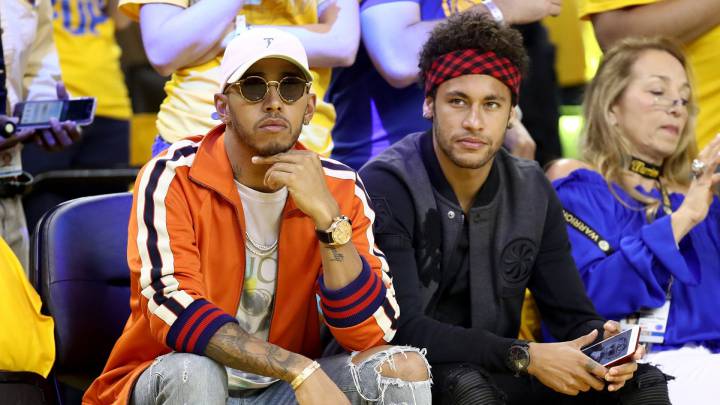 Lewis Hamilton y Neymar asistiendo juntos a un partido de la final de la pasada campañan de la NBA.