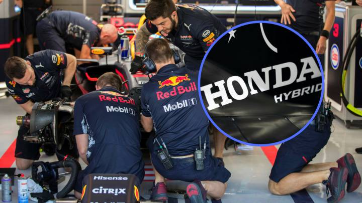Mecánicos de Red Bull y el logotipo de Honda.