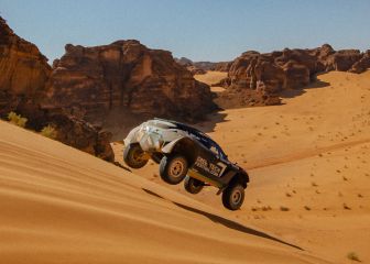 Rosberg celebra la primera con Cristina y Loeb en el podio