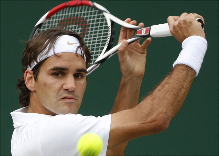 Federer gana a un digno Safin sin mostrar fisuras en su juego