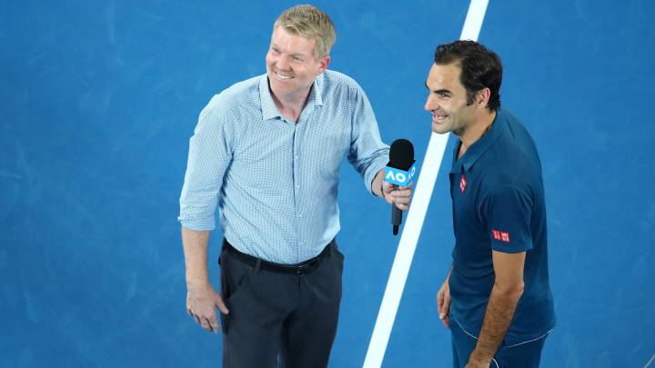  Roger Federer, con Jim Courier after his third round match against Taylor Fritz