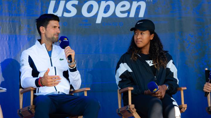 Naomi Osaka y Novak Djokovic, durante la ceremonia del sorteo de los cuadros masculino y femenino del US Open 2019.