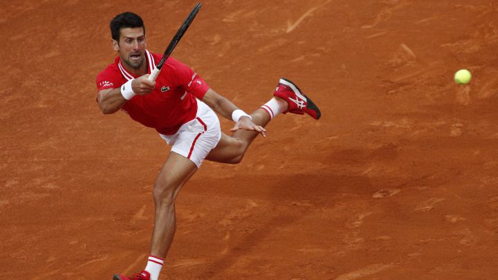 Novak Djokovic returns a ball during his match against Rafa Nadal in the final of the Masters 1,000 in Rome.