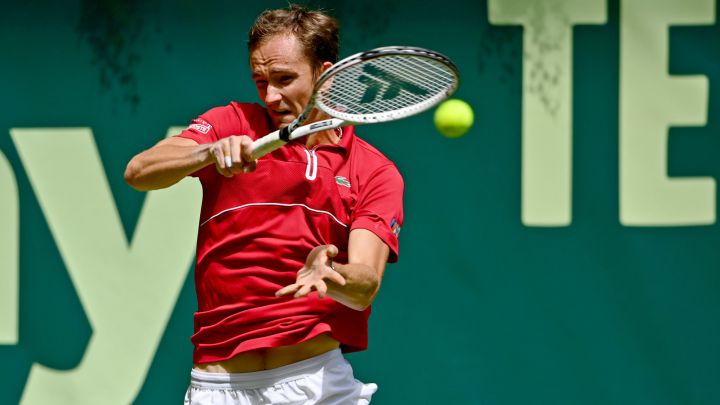 Daniil Medvedev returns a ball during his match against Jan-Lennard Struff at the Halle Tournament.