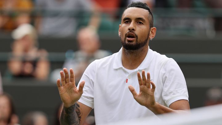 Nick Kyrgios reacts during his match against Felix Auger Aliassime in the third round of Wimbledon 2021.