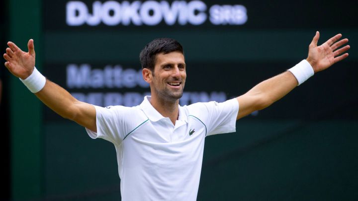 Novak Djokovic in celebration after winning Wimbledon 2021.