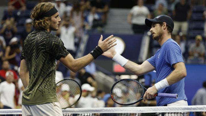 Stefanos Tsitsipas and Andy Murray greet each other after their first round match of the 2021 US Open at the USTA National Tennis Center in Flushing Meadows, New York, USA.