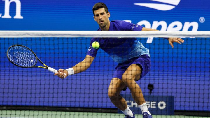 Novak Djokovic returns a ball during his match against Tallon Greikspoor at the US Open Tennis Championships at the USTA National Tennis Center in Flushing Meadows, New York.