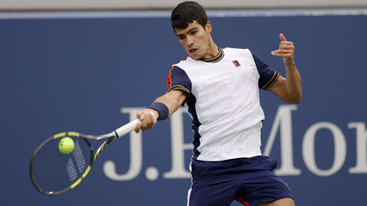 Spanish tennis player Carlos Alcaraz returns a ball during his match against Peter Gojowczyk in the round of 16 of the US Open at the USTA Billie Jean King National Tennis Center in New York.