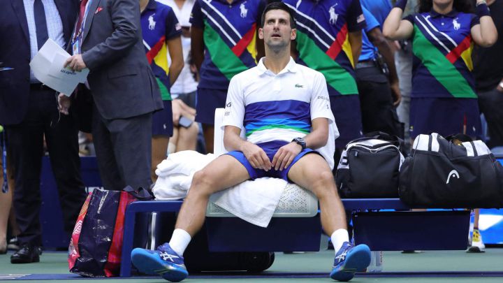 Serbia's Novak Djokovic applauds the crowd after losing to Russia's Daniil Medvedev during their 2021 US Open Tennis tournament men's final match at the USTA Billie Jean King National Tennis Center in New York, on September 12, 2021. (Photo by Kena Betancur / AFP)