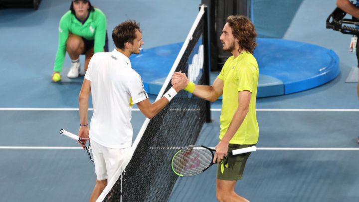 Russian Daniil Medvedev and Greek Stefanos Tsitsipas greet each other after their 2021 Australian Open semi-final match.