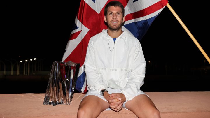 British tennis player Cameron Norrie poses with the title of champion after defeating Nikoloz Basilashvili in the final of the BNP Paribas Open, the Indian Wells Masters 1,000, at the Indian Wells Tennis Garden in Indian Wells, California.