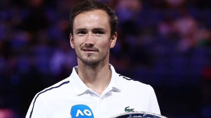 Russian tennis player Daniil Medvedev poses with the 2021 Australian Open runner-up trophy.