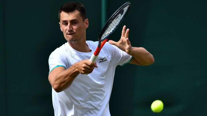 Tomic came out to play "stoned"