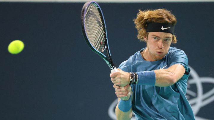 Andrey Rublev hits the ball,