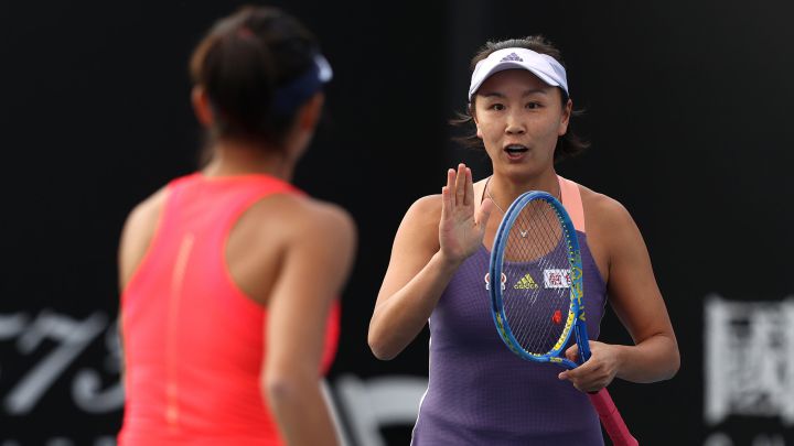 Chinese tennis player Shuai Peng with Shuai Zhang, during a doubles match at the 2020 Australian Open.