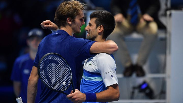 Alexander Zverev and Novak Djokovic greet each other after their match at the Nitto ATP Finals in Turin 2021.