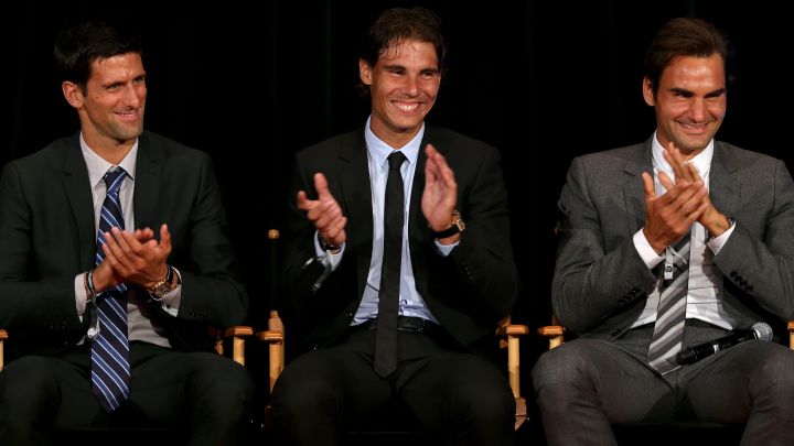 Novak Djokovic, Rafa Nadal and Roger Federer applaud during an ATP Heritage Celebration event at the Waldorf Astoria in New York in 2013.