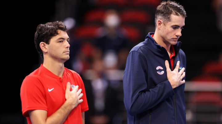 SYDNEY, AUSTRALIA - JANUARY 02: Taylor Fritz and John Isner of the United States of America stand for the anthem before Isner's group C match against Brayden Schnur of Canada during day two of the 2022 ATP Cup tie between the United States of America and Canada at Qudos Bank Arena on January 02, 2022 in Sydney, Australia.  (Photo by Mark Kolbe / Getty Images)