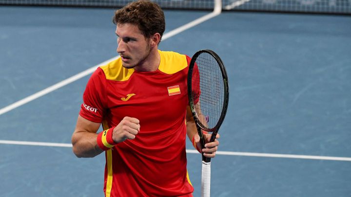 Pablo Carreno Busta celebrates after winning against Filip Krajinovic of Serbia during their Group A men's singles tennis match at the 2022 ATP Cup in Sydney on January 5, 2022. (Photo by Muhammad FAROOQ / AFP) / -- IMAGE RESTRICTED TO EDITORIAL USE - STRICTLY NO COMMERCIAL USE --