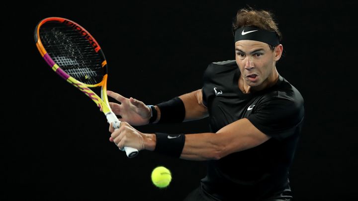 MELBOURNE, AUSTRALIA - JANUARY 06: Rafael Nadal of Spain plays a backhand in his match against Ricardas Berankis of Lithuania during day four of the Melbourne Summer Set at Melbourne Park on January 06, 2022 in Melbourne, Australia. (Photo by Graham Denholm/Getty Images)