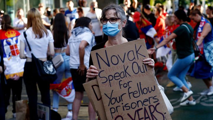 Protester in favor of Novak Djokovic.