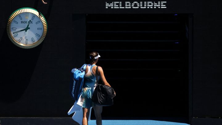 Tennis - Australian Open - Melbourne Park, Melbourne, Australia - January 20, 2022 Spain's Garbine Muguruza walk out after losing her second round match against France's Alize Cornet REUTERS/Asanka Brendon Ratnayake