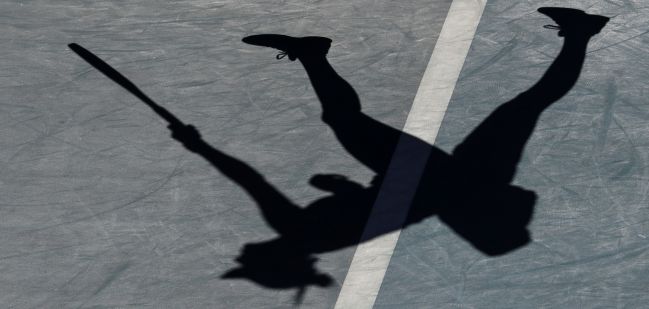 The shadow on the court of Swiss tennis player Belinda Bencic serving during her Australian Open second round match.