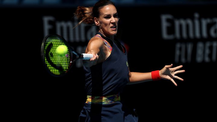 MELBOURNE, AUSTRALIA - JANUARY 21: Nuria Parrizas Diaz of Spain plays a forehand in her third round singles match against Jessica Pegula of United States during day five of the 2022 Australian Open at Melbourne Park on January 21, 2022 in Melbourne, Australia. (Photo by Mark Metcalfe/Getty Images)