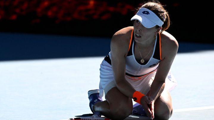 Tennis - Australian Open - Melbourne Park, Melbourne, Australia - January 24, 2022 France's Alize Cornet celebrates winning her fourth round match against Romania's Simona Halep REUTERS/Morgan Sette