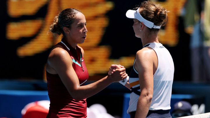 Madison Keys of the US shakes hands with Czech Republic's Barbora Krejcikova (R) after their women's singles quarter-final match on day nine of the Australian Open tennis tournament in Melbourne on January 25, 2022. (Photo by Martin KEEP / AFP) / -- IMAGE RESTRICTED TO EDITORIAL USE - STRICTLY NO COMMERCIAL USE --