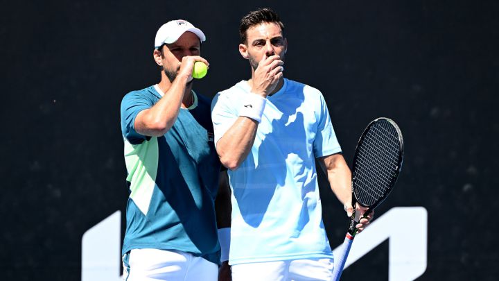 MELBOURNE, AUSTRALIA - JANUARY 19: Marcel Granollers of Spain and Horacio Zeballos of Argentina compete in their first round doubles match against Yoshihito Nishioka of Japan and Jiri Vesely of the Czech Republic  during day three of the 2022 Australian Open at Melbourne Park on January 19, 2022 in Melbourne, Australia. (Photo by Quinn Rooney/Getty Images)