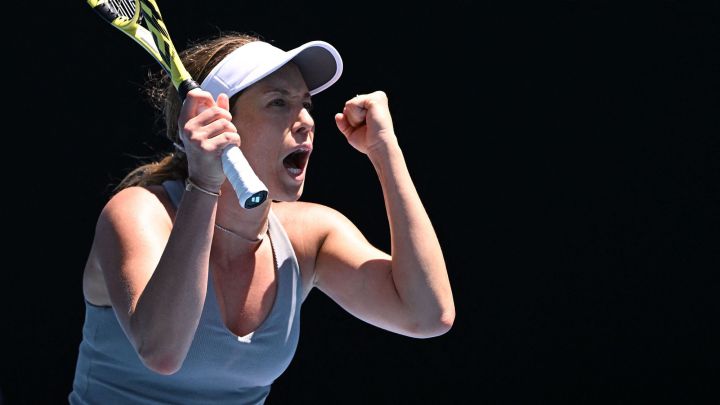 Danielle Collins of the US reacts after winning against France's Alize Cornet during their women's singles quarter-final match on day ten of the Australian Open tennis tournament in Melbourne on January 26, 2022. (Photo by MICHAEL ERREY / AFP) / -- IMAGE RESTRICTED TO EDITORIAL USE - STRICTLY NO COMMERCIAL USE --